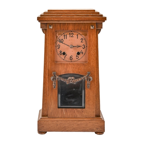 An Art Deco style German oak mantel