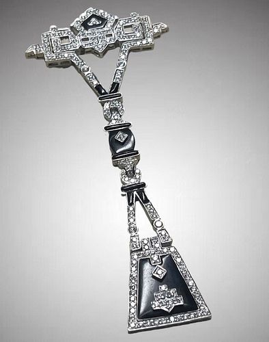 AN ART DECO STYLE ONYX DIAMOND