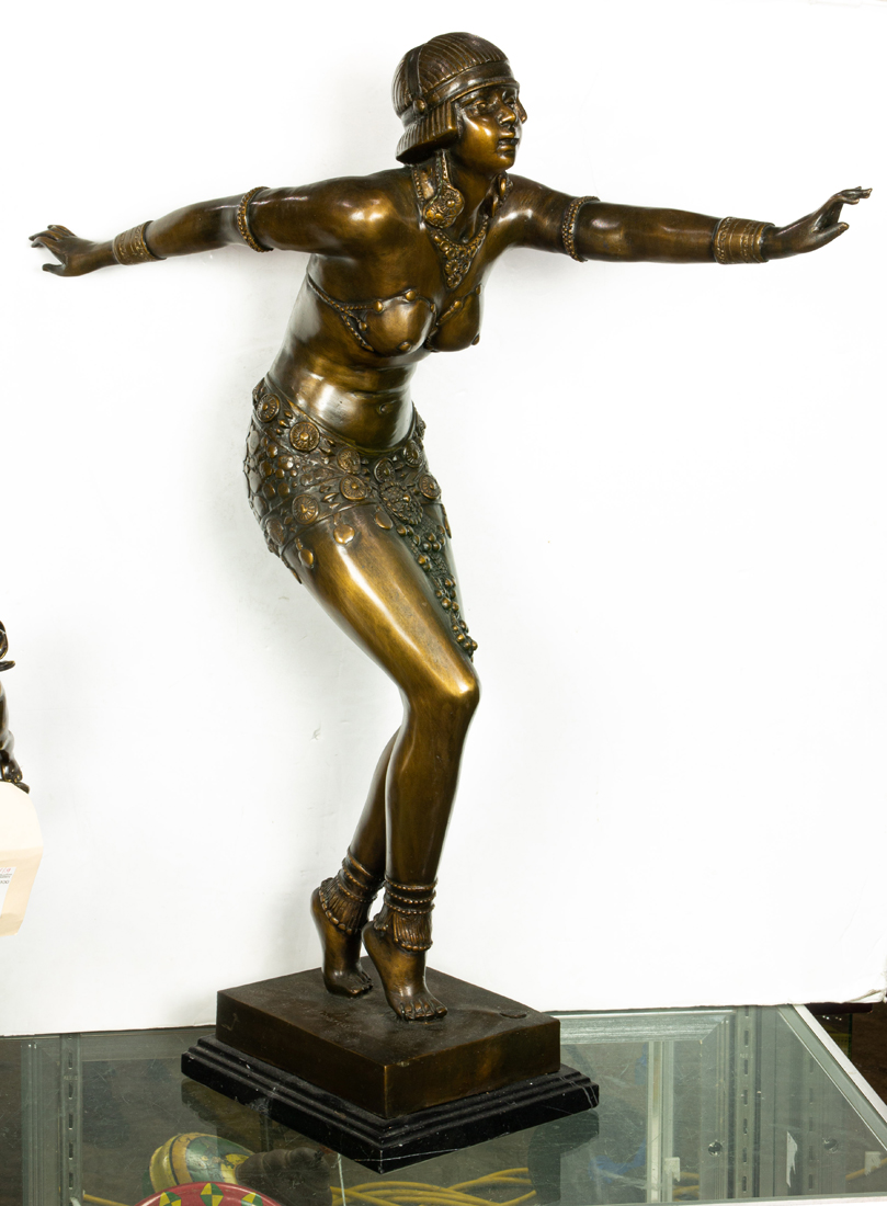 AN ART DECO STYLE PATINATED