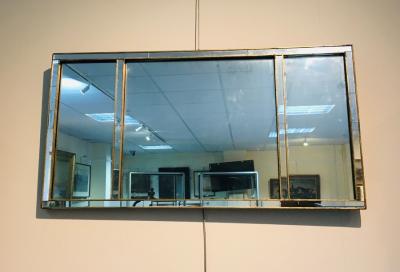 An Art Deco wall mirror, the