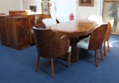 An Art Deco walnut eight piece