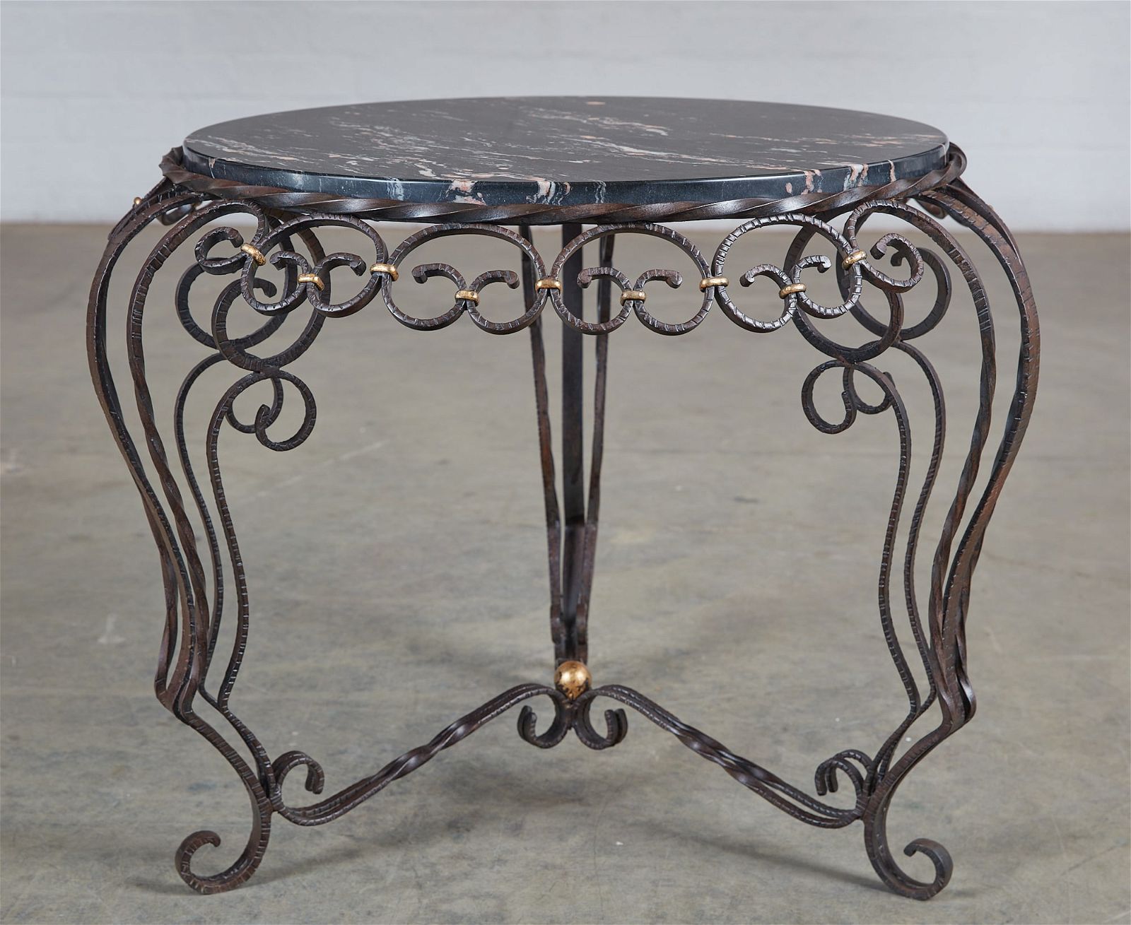 AN ART DECO WROUGHT IRON AND MARBLE
