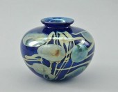 An Art Glass Blue Vase With Ir