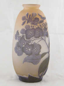 An art glass vase with floral
