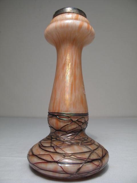 An art glass vase with confetti and