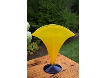 An art glass yellow pillow form