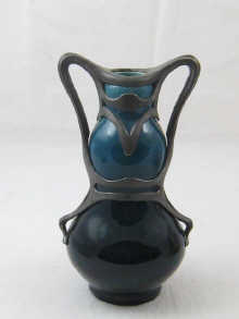 An Art Nouveau ceramic vase of