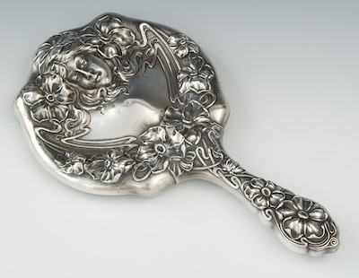 An Art Nouveau Hand Mirror The