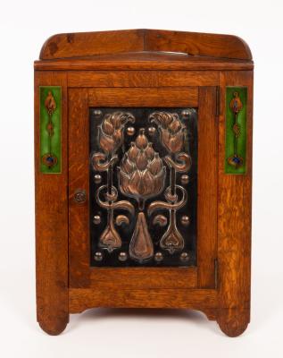 An Art Nouveau oak, copper and