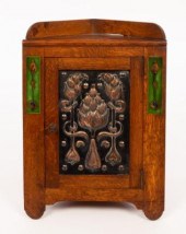 An Art Nouveau oak, copper and