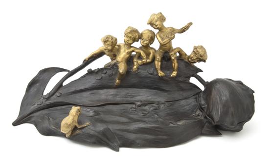 An Art Nouveau Patinated and Gilt