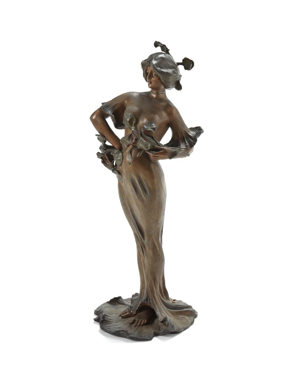 AN ART NOUVEAU PATINATED METAL