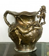 AN ART NOUVEAU PATINATED METAL
