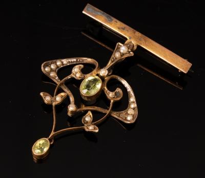 An Art Nouveau peridot and seed