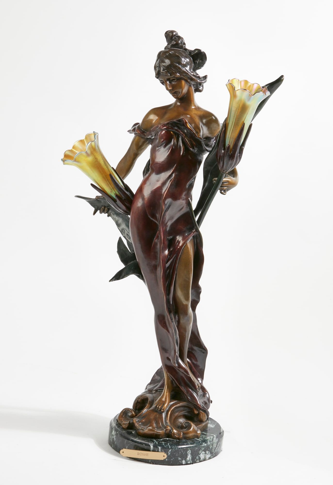 AN ART NOUVEAU STYLE PATINATED