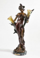AN ART NOUVEAU STYLE PATINATED