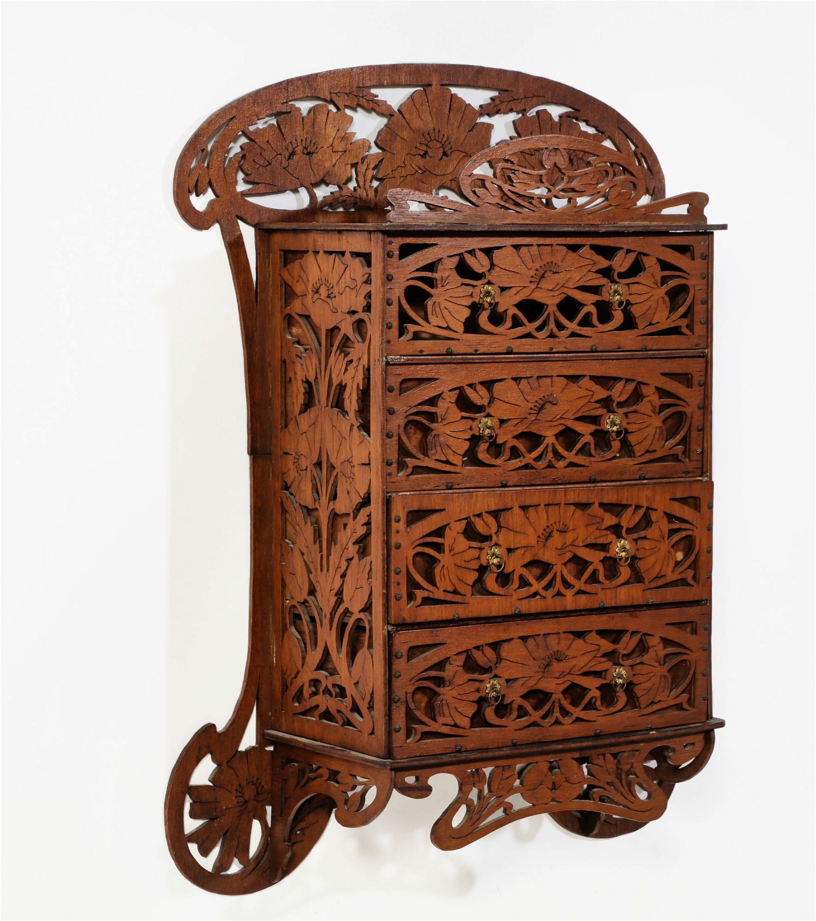 AN ART NOUVEAU WALNUT FRETWORK