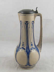 An Art Noveau stoneware ewer by