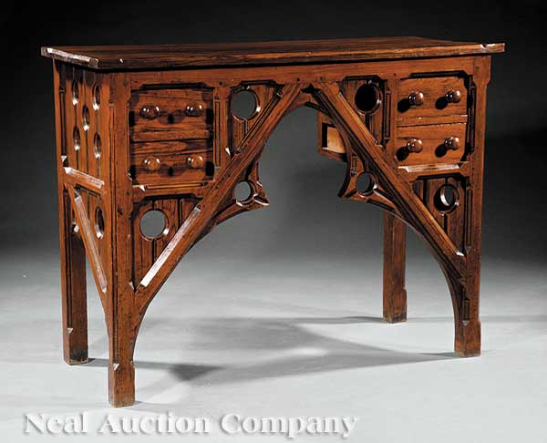 An Arts and Crafts Carved Pine