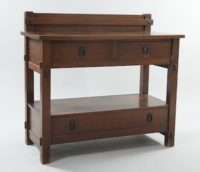 An Arts and Crafts Oak Sideboard In