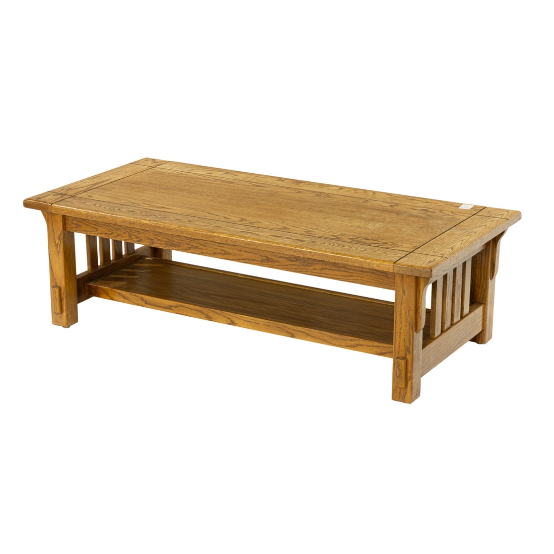 AN ARTS AND CRAFTS STYLE OAK LOW