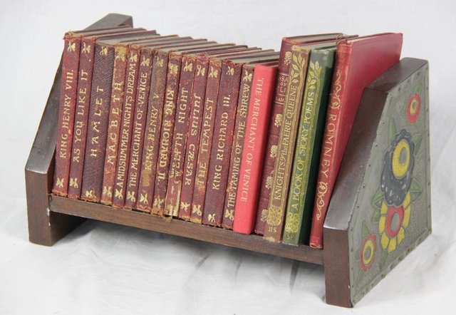 An Arts & Crafts bookstand the ends