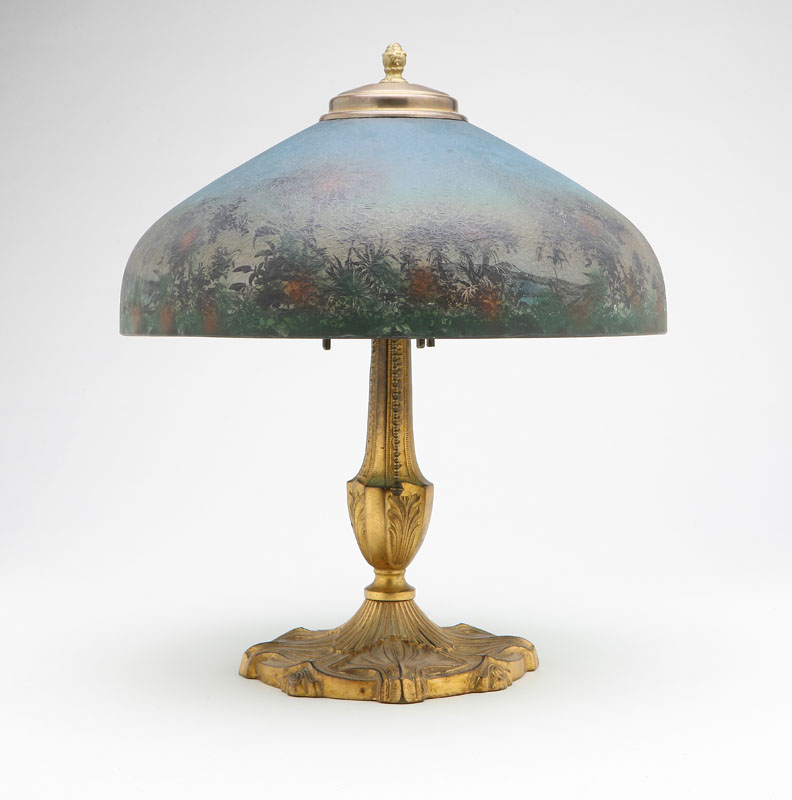 An Arts & Crafts gilt-metal lamp