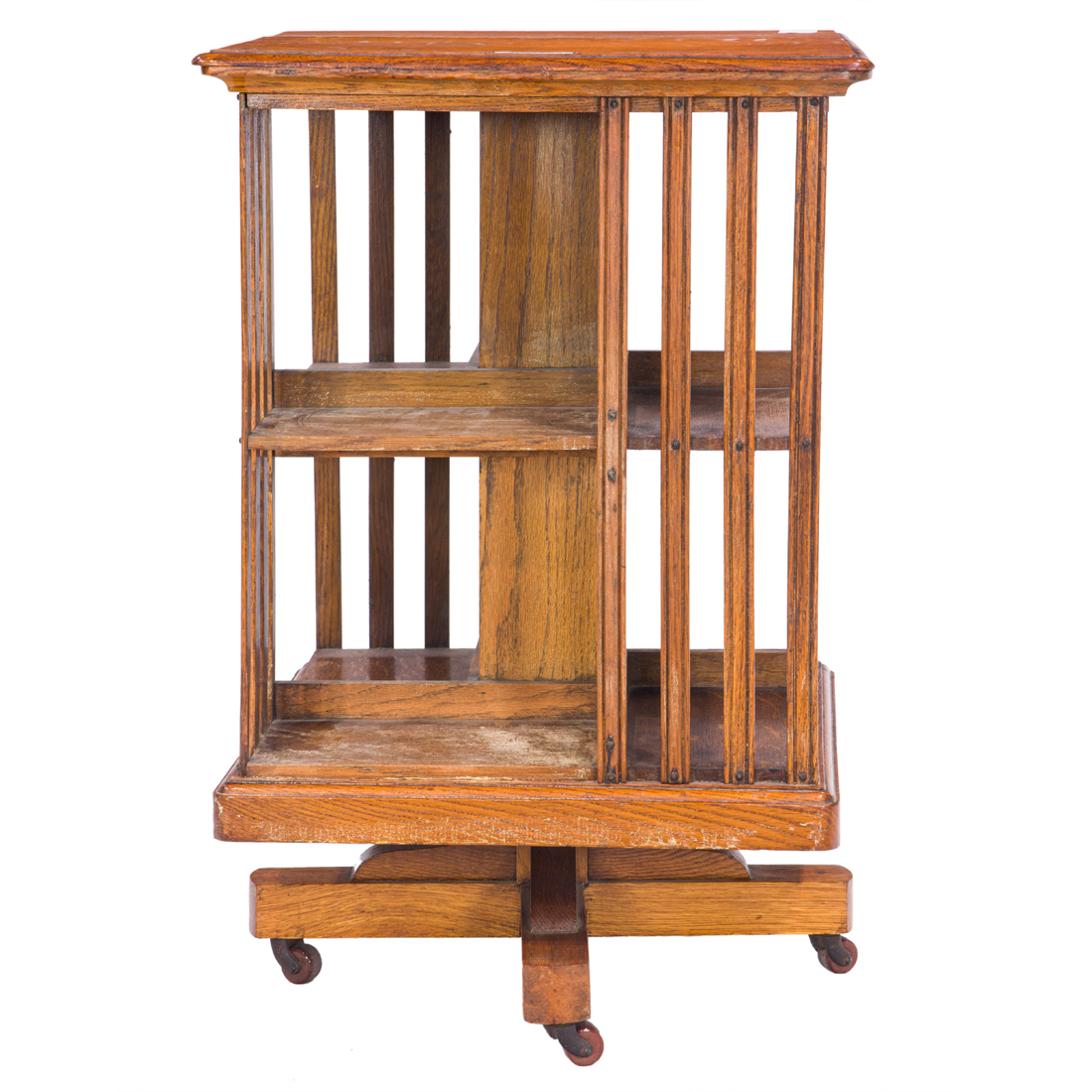 AN ARTS & CRAFTS OAK REVOLVING BOOK