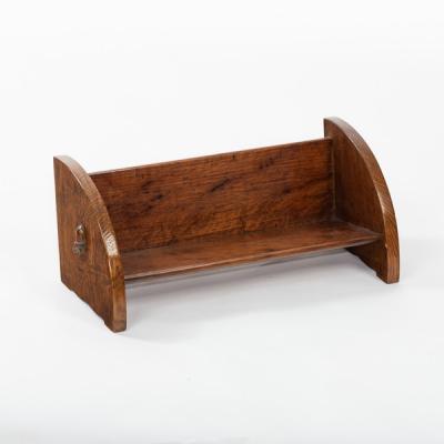 An Arts & Crafts oak book trough,