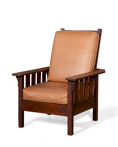 AN ARTS & CRAFTS OAK MORRIS CHAIRAn