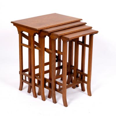 An Arts & Crafts style nest of four