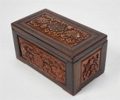 AN ASIAN CARVED WOOD BOXAn Asi
