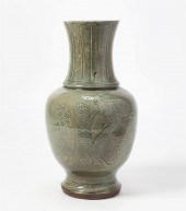 AN ASIAN CELADON GLAZED PORCEL