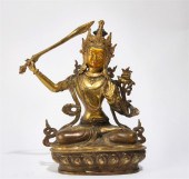 AN ASIAN GILT METAL BRONZE SEA