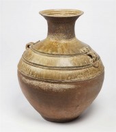 AN ASIAN GLAZED EARTHENWARE VA