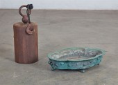 AN ASIAN METAL BELL AND A META