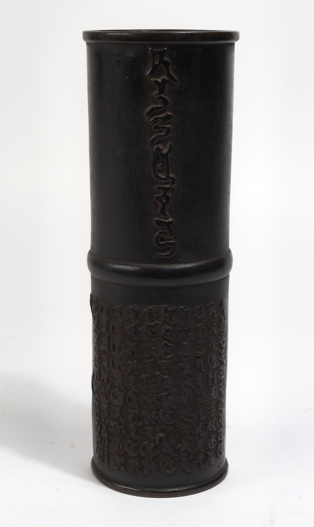 AN ASIAN PATINATED BRONZE