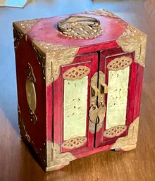 An Asian rosewood jewelry cabinet