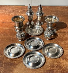 An assembled lot of salt shakers,