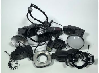 An assembled lot of six hot shoe