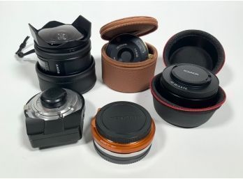 An assembled lot of Sony lenses and