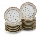 AN ASSEMBLED SUITE OF LIMOGES