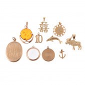 AN ASSORTMENT OF CHARMS IN 14K