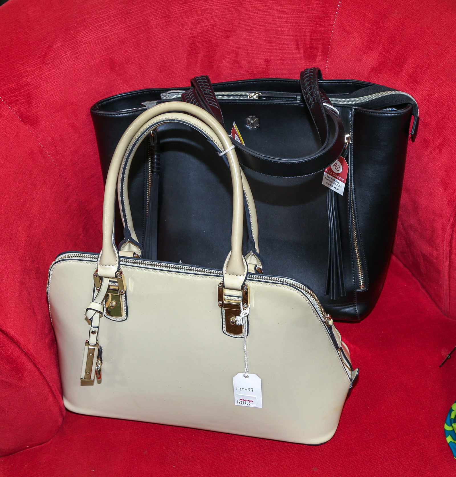 AN ASSORTMENT OF HANDBAGS &