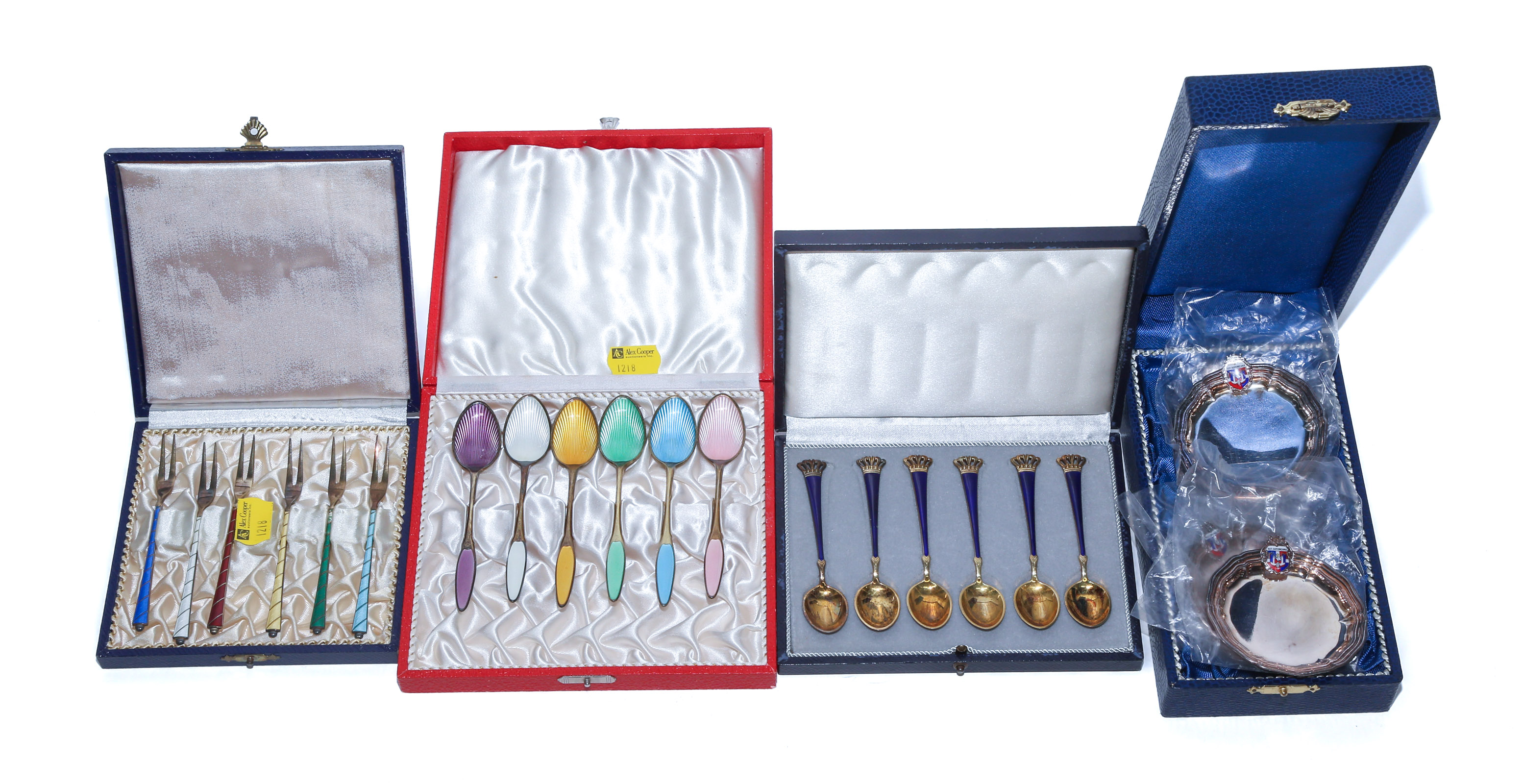 AN ASSORTMENT OF STERLING FORKS &