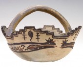 AN ATYPICAL ZUNI POTTERY BASKE