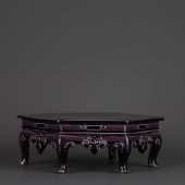 AN AUBERGINE-GLAZED CARVED 'FL