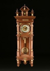 AN AUSTRIAN CARVED WALNUT THRE