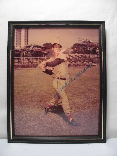An autographed 8'' x 10''