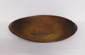 AN CARVED OVAL FORM WOODEN TRE
